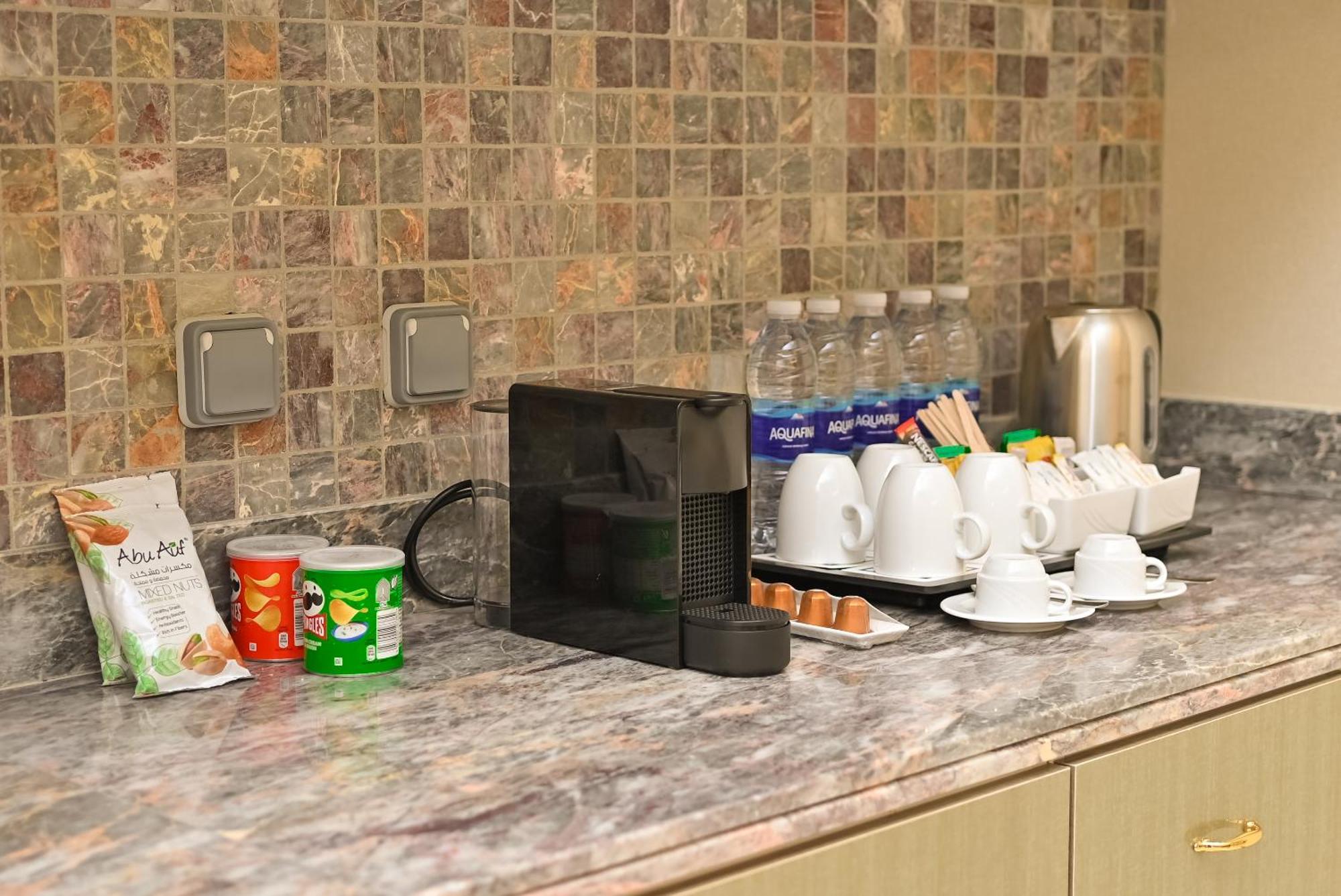 힐튼 후르가다 플라자 호텔 외부 사진 A Nespresso coffee machine